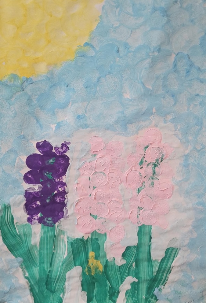 Kinderbild: Blumen auf einer Wiesenfläche